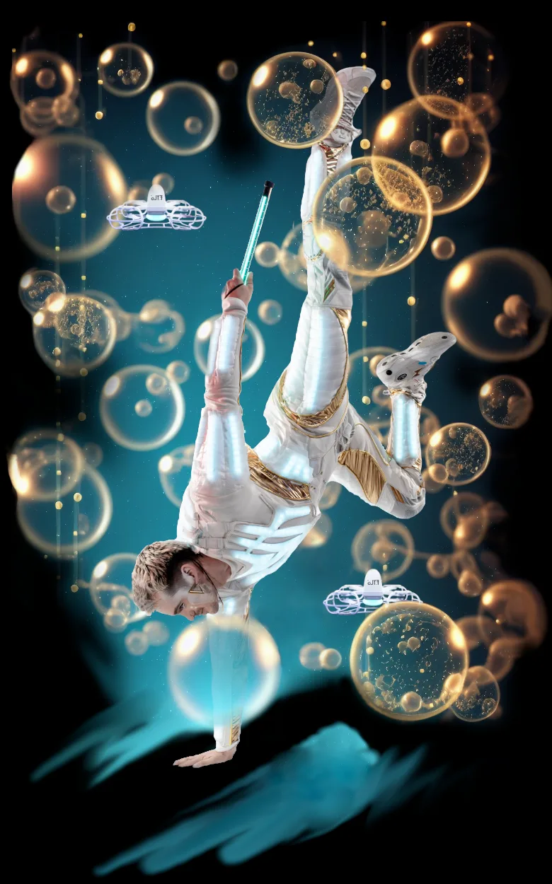 Dalton Sessumes performing among floating bubbles